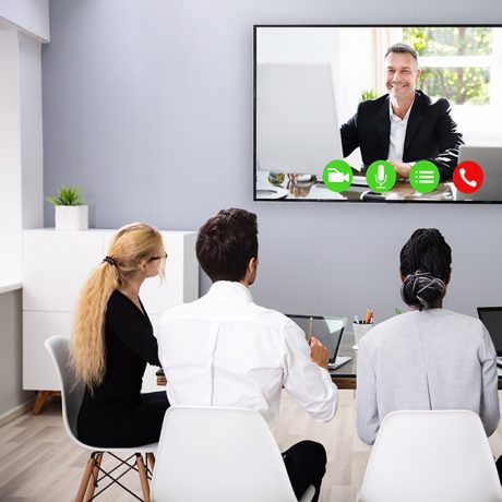Office Using Smart Home Technology to Collaborate on Zoom, Microsoft Teams, via video conference technology for a hybrid workplace Office Using Smart Home Technology to Collaborate on Zoom, Microsoft Teams, via video conference technology for a hybrid workplace